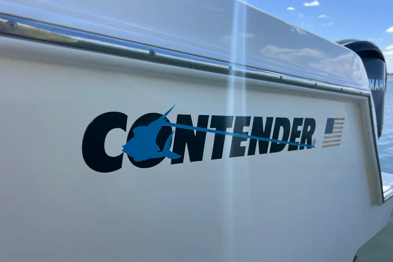 Slide: The Image of 2023 Contender 39 ST boat logo with American flag detail. - 34