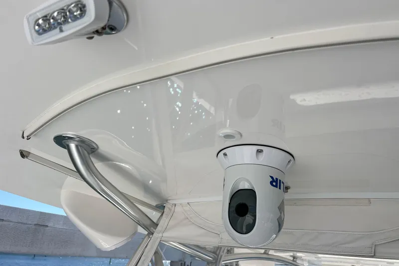 Slide: The Image of 2023 Contender 39 ST boat with mounted FLIR camera and LED light on the ceiling. - 36