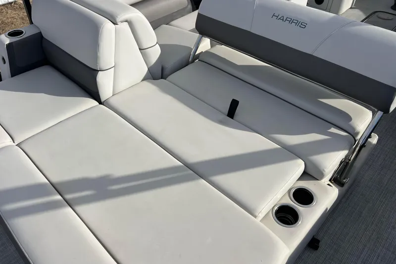 Slide: The Image of Luxurious seating on 2023 Harris Cruiser 210 SL pontoon boat with cup holders. - 22