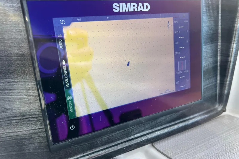 Slide: The Image of Simrad display on 2023 Harris Cruiser 210 SL boat dashboard. - 35