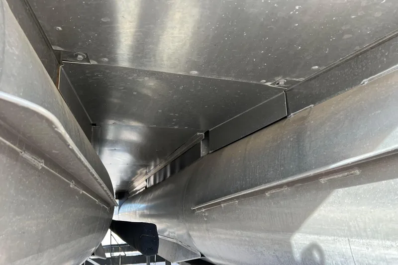 Slide: The Image of Underneath view of 2023 Harris Cruiser 210 SL pontoon boat, showcasing aluminum structure. - 9