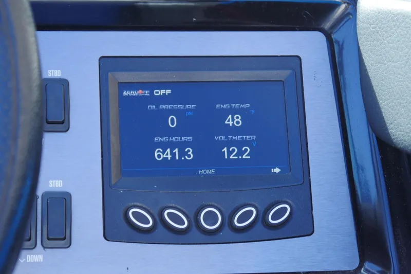 Slide: The Image of 2020 MasterCraft NXT22 dashboard display showing engine hours, temperature, and voltmeter readings. - 13