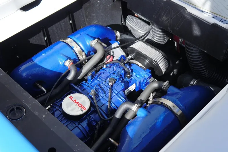 Slide: The Image of 2020 MasterCraft NXT22 engine compartment with blue Ilmor engine components. - 16