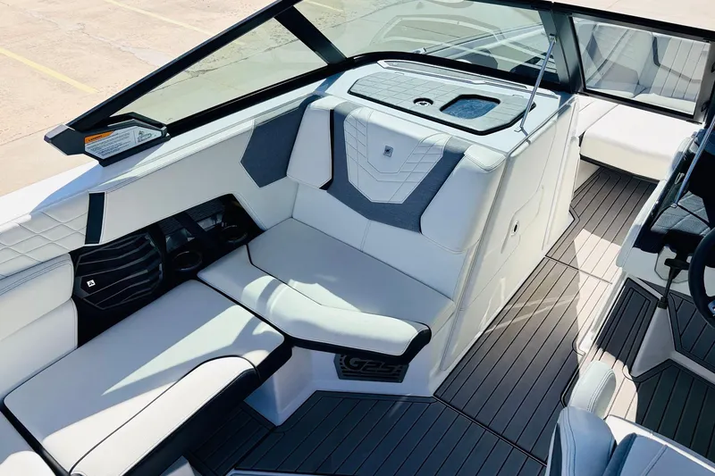 Slide: The Image of 2023 Nautique Super Air Nautique G25 interior with sleek seating and modern design. - 23