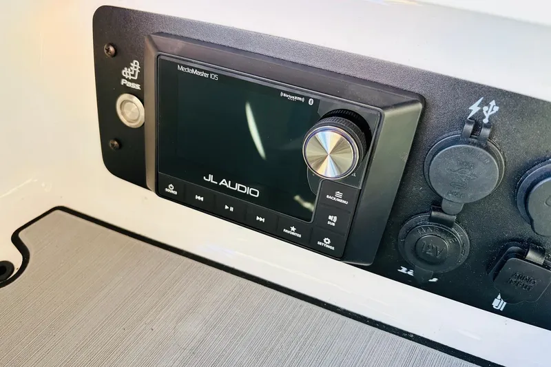 Slide: The Image of 2023 Nautique Super Air Nautique G25 JL Audio system with control panel. - 26