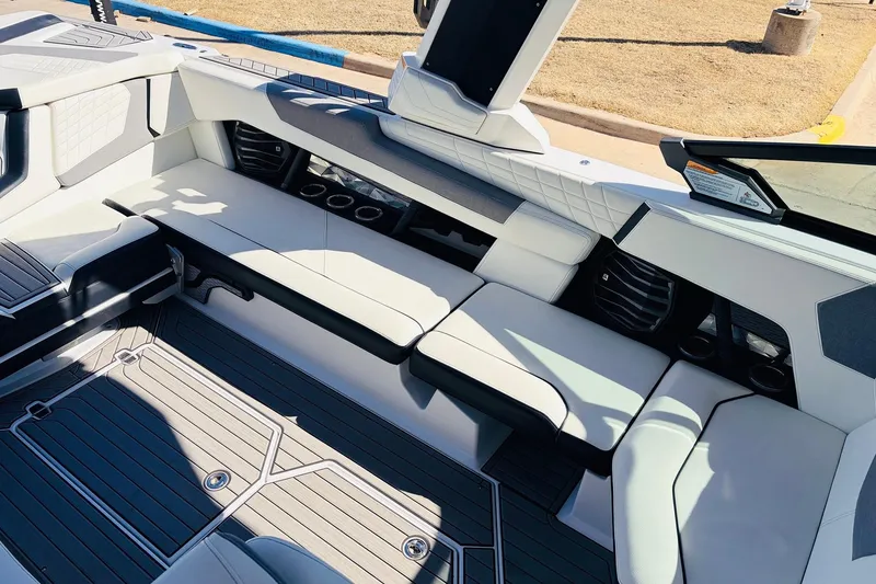 Slide: The Image of 2023 Nautique Super Air Nautique G25 interior with sleek seating and modern design. - 30
