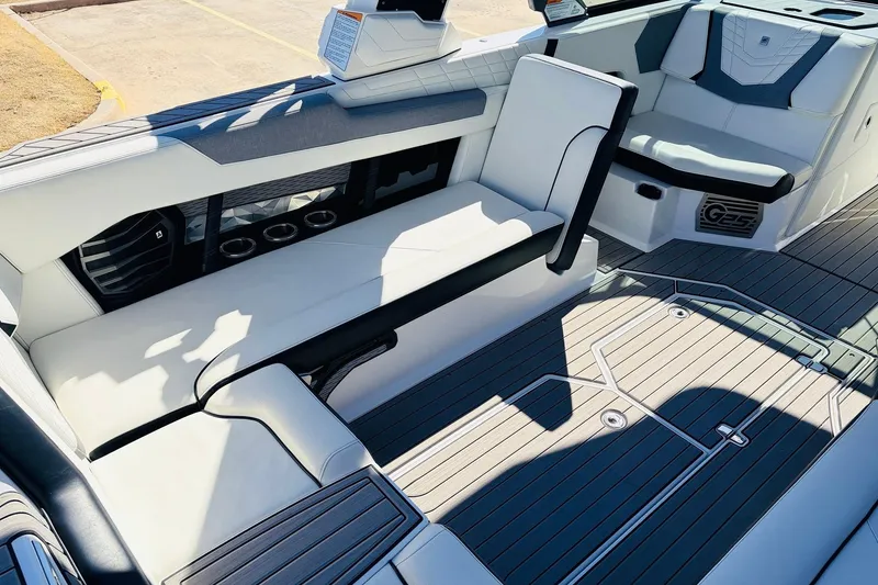 Slide: The Image of 2023 Nautique Super Air Nautique G25 interior with sleek seating and modern design. - 32