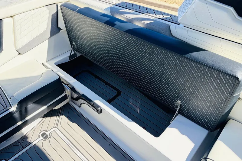 Slide: The Image of 2023 Nautique Super Air Nautique G25 interior storage compartment, open and spacious. - 33
