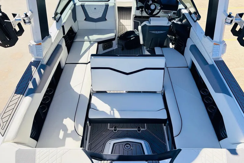 Slide: The Image of 2023 Nautique Super Air Nautique G25 interior with luxurious seating and modern design. - 35