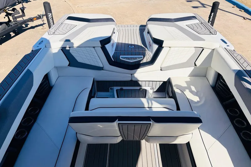 Slide: The Image of 2023 Nautique Super Air Nautique G25 interior with luxurious seating and modern design. - 36