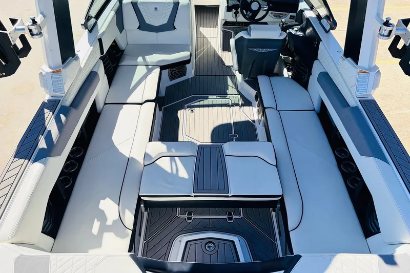 Slide: The Image of 2023 Nautique Super Air Nautique G25 interior with luxurious seating and modern design. - 37