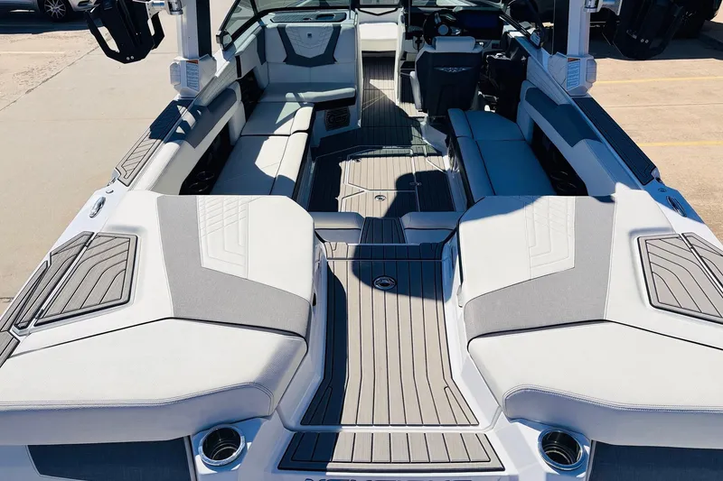 Slide: The Image of 2023 Nautique Super Air Nautique G25 interior with sleek seating and modern design. - 9