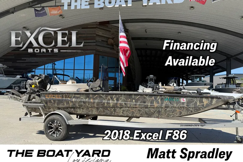 The Image of 2018 Excel F86 boat on trailer at dealership, financing available. - 1
