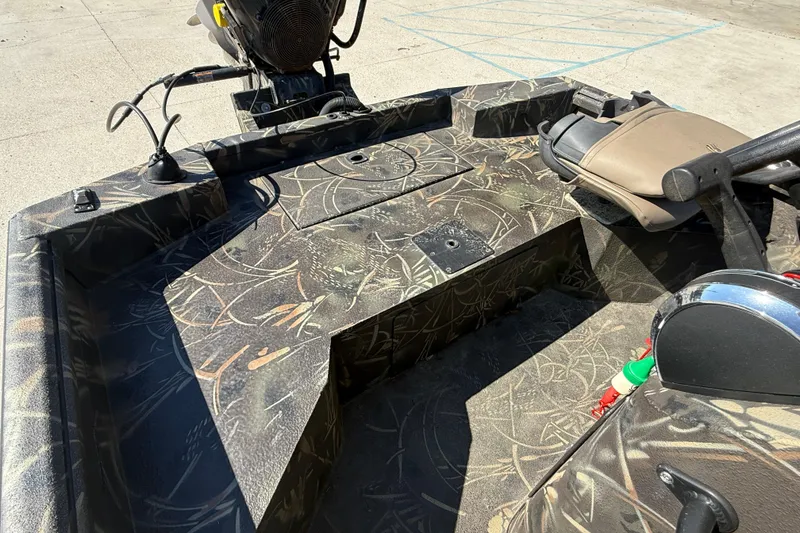 Slide: The Image of 2018 Excel F86 boat interior with camouflage design and seating. - 11