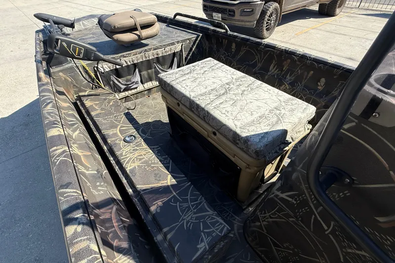 Slide: The Image of 2018 Excel F86 boat interior with camouflage design and seating. - 9