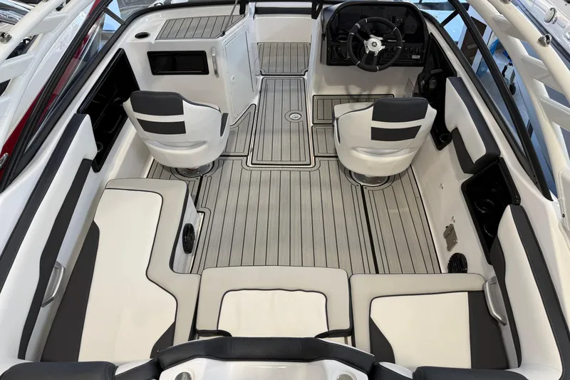 Slide: The Image of 2025 Yamaha Boats 195S interior with sleek seating and modern dashboard design. - 3