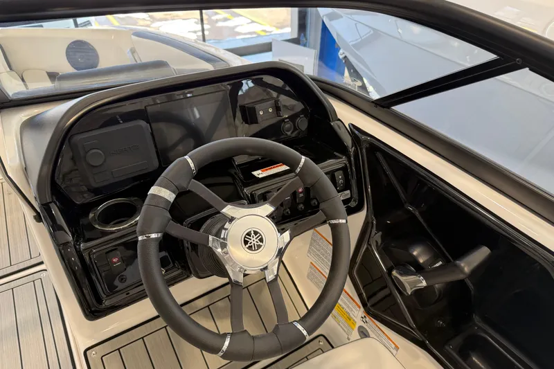 Slide: The Image of 2025 Yamaha Boats 195S steering wheel and dashboard interior view. - 6