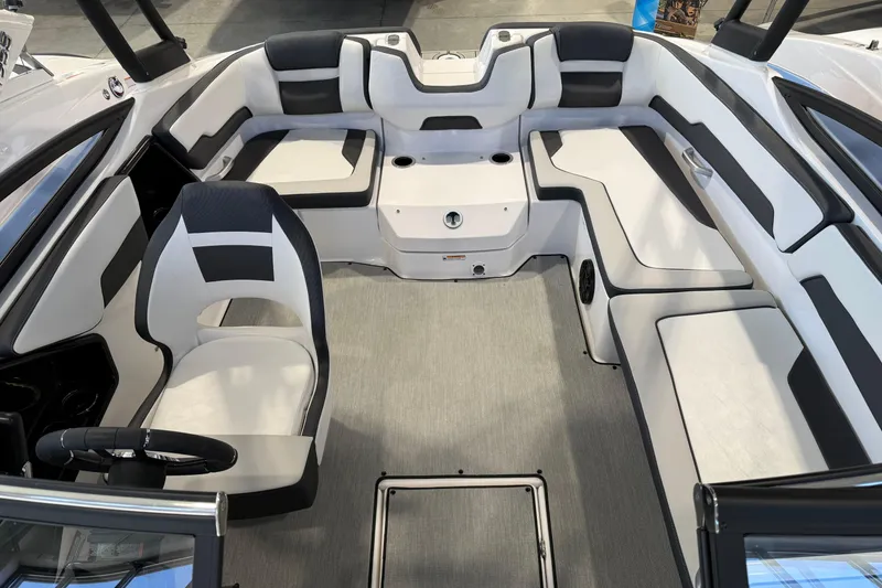 Slide: The Image of 2025 Yamaha Boats AR195 interior with sleek seating and modern design. - 2