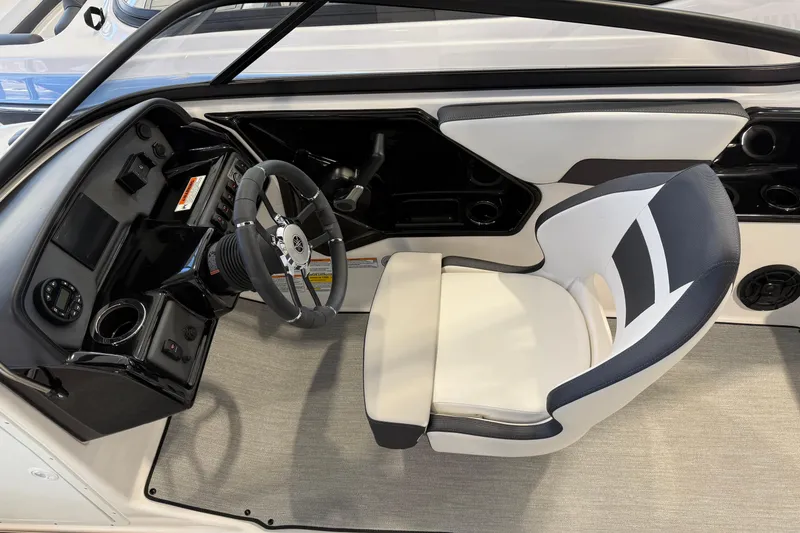 Slide: The Image of 2025 Yamaha Boats AR195 cockpit with modern steering wheel and comfortable seating. - 3