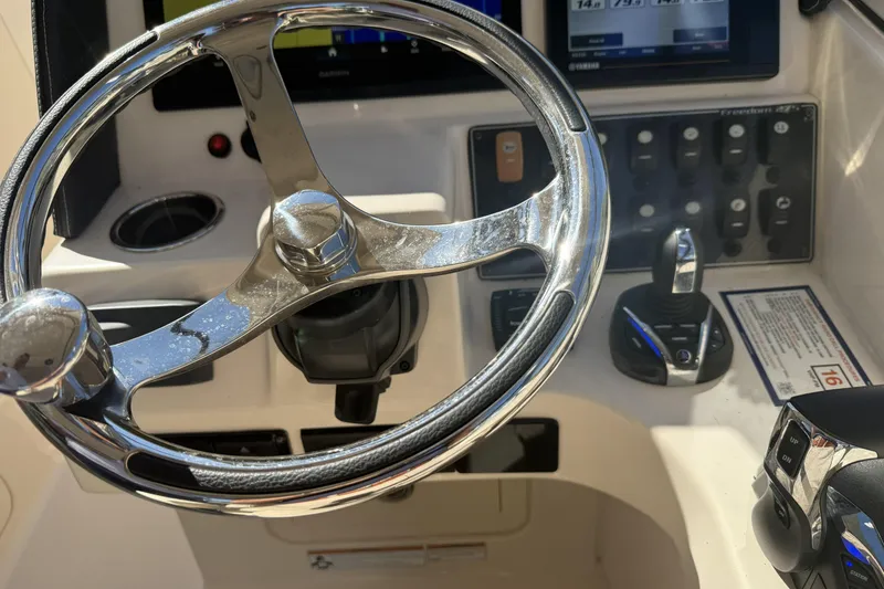 Slide: The Image of Close-up of Yamaha LF200XCA engine on 2022 Grady-White Freedom 275 boat. - 15