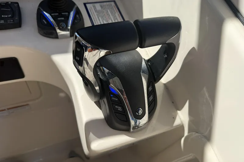 Slide: The Image of 2022 Grady-White Freedom 275 boat interior with seating and storage compartments. - 16