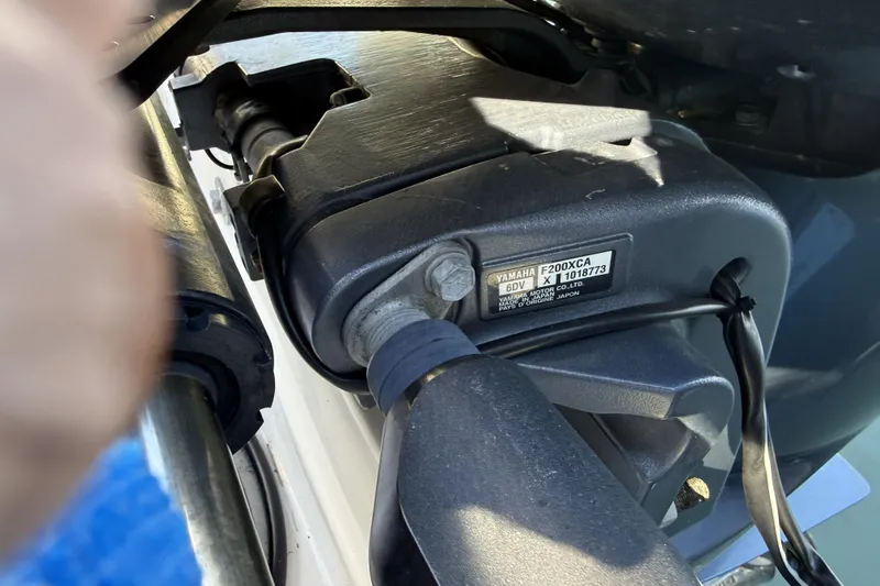 Slide: The Image of 2022 Grady-White Freedom 275 boat cruising on a sunny day. - 6