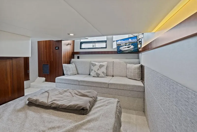 Slide: The Image of Luxurious interior of 2023 Cruisers 42 Cantius yacht with cozy seating and modern decor. - 44