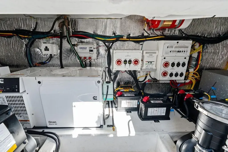 Slide: The Image of Electrical system of 2023 Cruisers 42 Cantius yacht, featuring Onan Marine generator. - 45