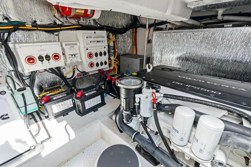 Slide: The Image of Engine room of 2023 Cruisers 42 Cantius yacht with Volvo Penta engine and electrical systems. - 46