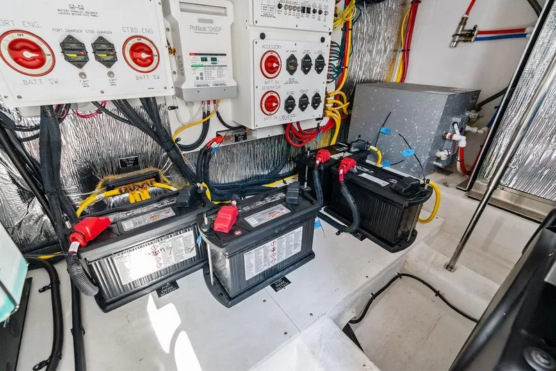 Slide: The Image of Electrical system of 2023 Cruisers 42 Cantius yacht with batteries and wiring. - 47