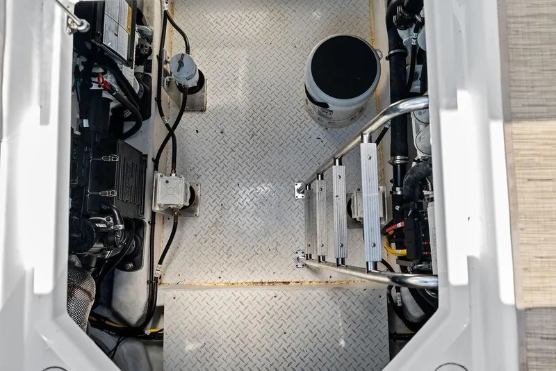 Slide: The Image of Engine room of 2023 Cruisers 42 Cantius yacht with ladder and equipment. - 53