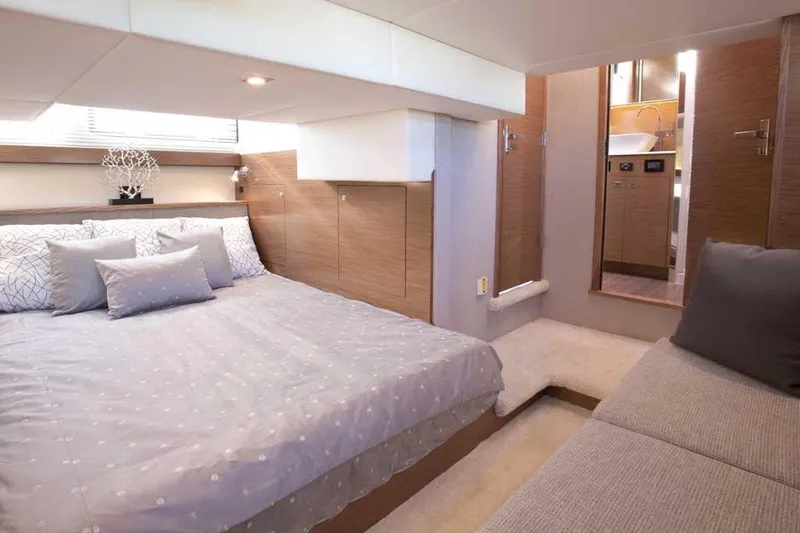 Slide: The Image of Luxurious bedroom interior of 2023 Cruisers 42 Cantius yacht with modern decor. - 6