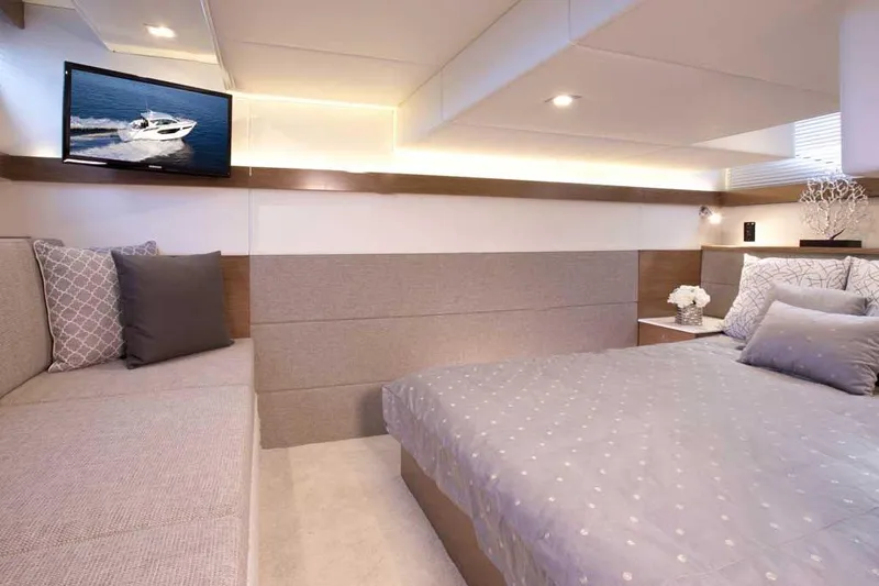 Slide: The Image of Luxurious interior of 2023 Cruisers 42 Cantius yacht with elegant bedroom and modern decor. - 7