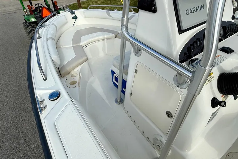 Slide: The Image of 2008 Boston Whaler 210 Outrage boat interior with seating and Garmin navigation system. - 11