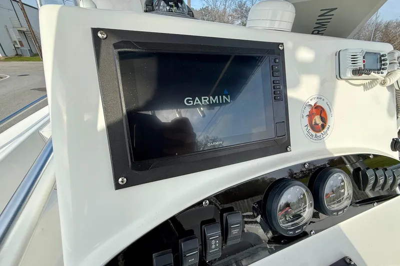 Slide: The Image of Dashboard of a 2008 Boston Whaler 210 Outrage with Garmin navigation system. - 15
