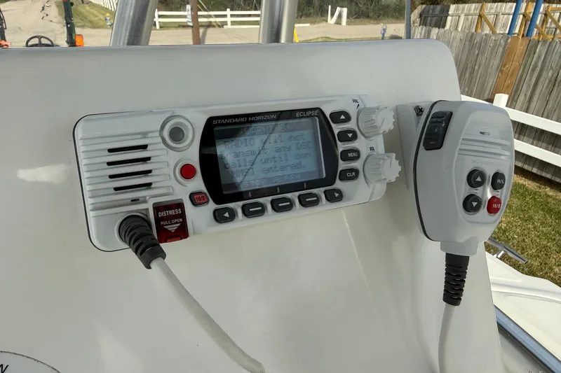 Slide: The Image of Control panel of a 2008 Boston Whaler 210 Outrage boat with radio equipment. - 19