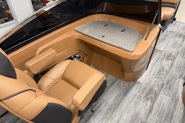 Slide: The Image of Luxurious interior of 2023 Avalon Catalina 2585 QL boat with tan seating and modern design. - 21