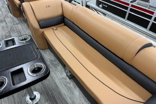 Slide: The Image of Luxurious seating on 2023 Avalon Catalina 2585 QL pontoon boat with sleek design and cup holders. - 22