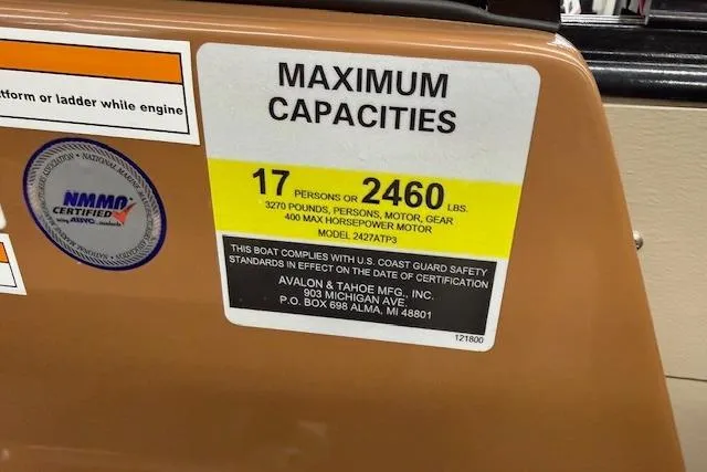 Slide: The Image of 2023 Avalon Catalina 2585 QL boat capacity label, 17 persons or 2460 lbs, NMMA certified. - 31