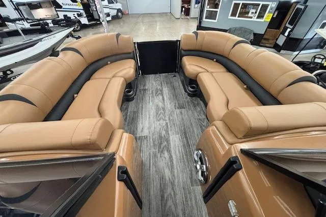 Slide: The Image of 2023 Avalon Catalina 2585 QL pontoon boat with luxurious tan seating and wood-style flooring. - 36