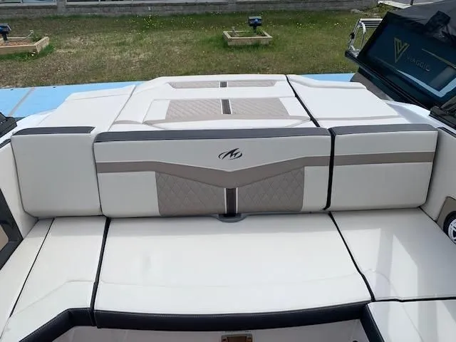 Slide: The Image of Rear view of a 2021 Monterey 218 Super Sport boat. - 10