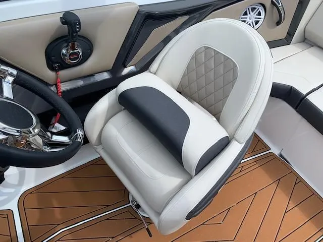 Slide: The Image of Luxurious seating in a 2021 Monterey 218 Super Sport boat. - 5