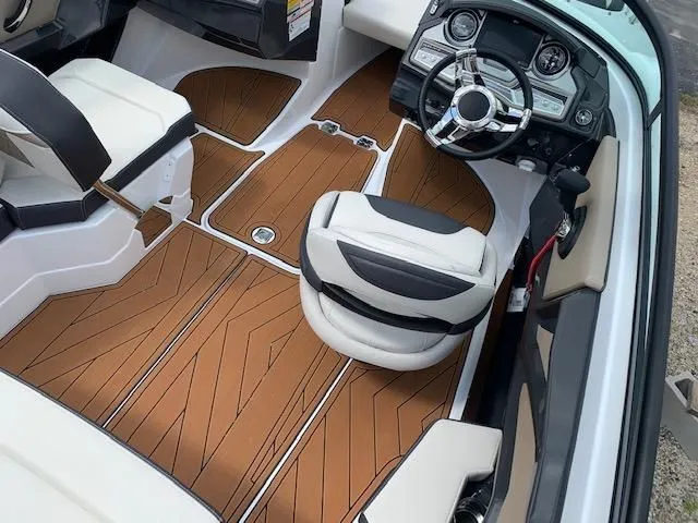 Slide: The Image of Interior of a 2021 Monterey 218 Super Sport boat with modern design. - 6