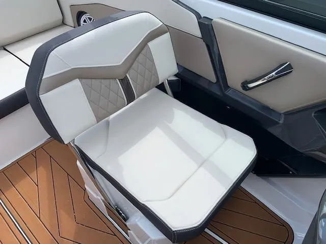 Slide: The Image of Luxurious seating in a 2021 Monterey 218 Super Sport boat. - 8