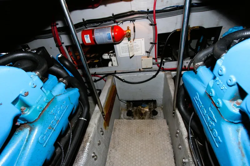 Slide: The Image of Engine room of 1998 Silverton 372 Motor Yacht with blue Crusader engines. - 37