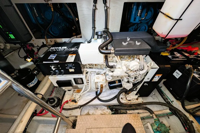 Slide: The Image of Engine room of 1998 Silverton 372 Motor Yacht with Kohler power system. - 38