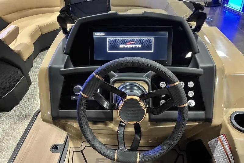 Slide: The Image of Steering console of 2026 Evotti 723CS boat with modern dashboard and controls. - 6