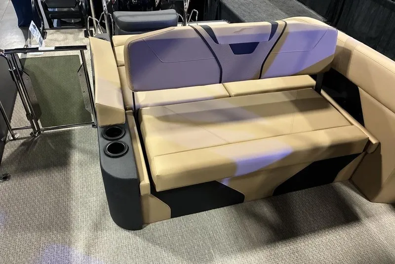Slide: The Image of Evotti 723CS 2026 model boat seating with cup holders and beige upholstery. - 9