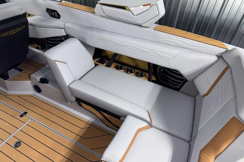 Slide: The Image of 2026 Nautique Super Air Nautique G23 interior with luxurious seating and modern design. - 10