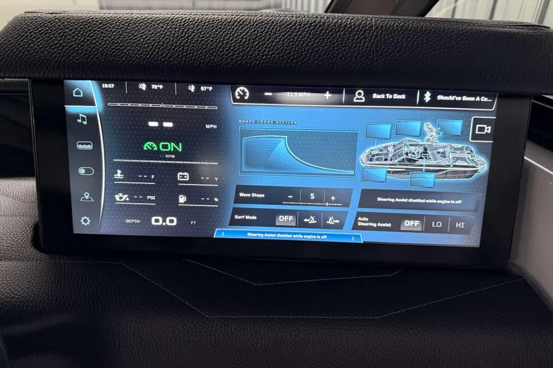 Slide: The Image of Touchscreen display of 2026 Nautique Super Air Nautique G23 boat, showing controls and settings. - 17